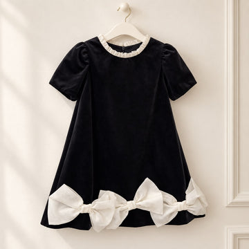 Abito elegante bambina nero con tre maxi fiocchi avorio e maniche a palloncino
