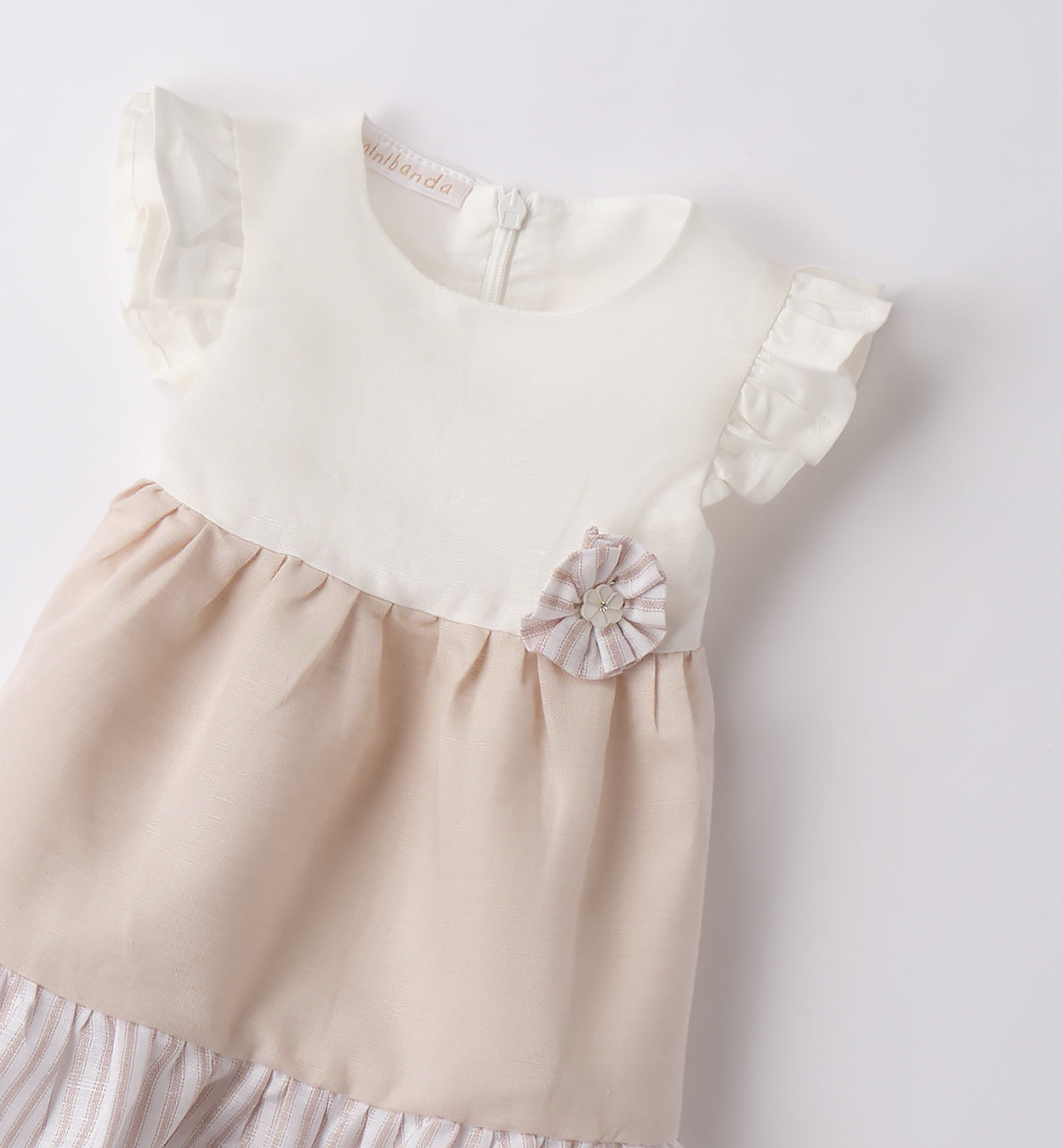 Retro dell'abito bicolore in lino e cotone per bambina, con chiusura zip e balza a righe, ideale per un look elegante e casual chic