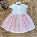 Retro abito rosa neonata con fiocco in organza