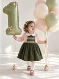 Abito bimba velluto millerighe verde con punto smock e colletto bianco