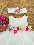 Abito in tulle e fiori fucsia