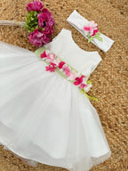 Abito in tulle e fiori fucsia