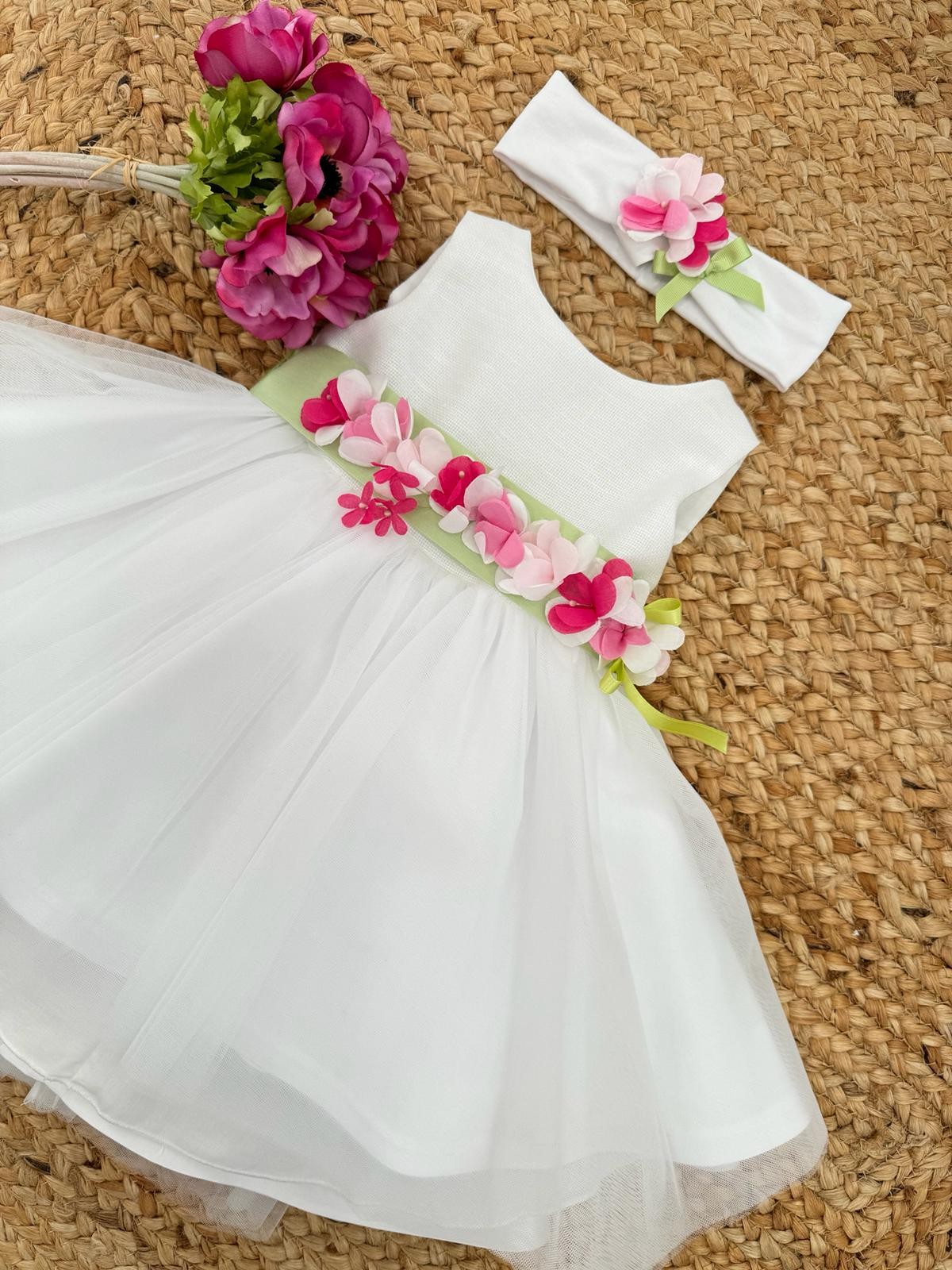 Abito in tulle e fiori fucsia