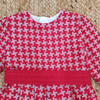 Abito Pied de Poule Rosso con Gonna a Pieghe
