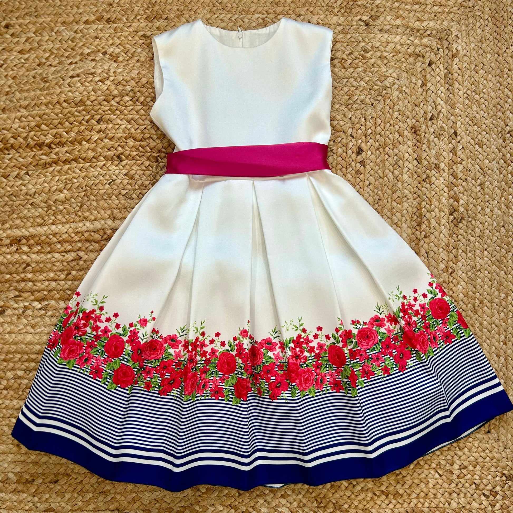 abito bimba elegante con cintura fucsia vista frontale