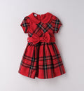 abito scozzese rosso con maxi fiocco per bambina fronte