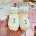 Copertina neonata in pura lana rosa, latte e beige con coordinato nascita Made in Italy.