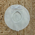basco beige Condor per neonata con fiocco in velluto tono su tono