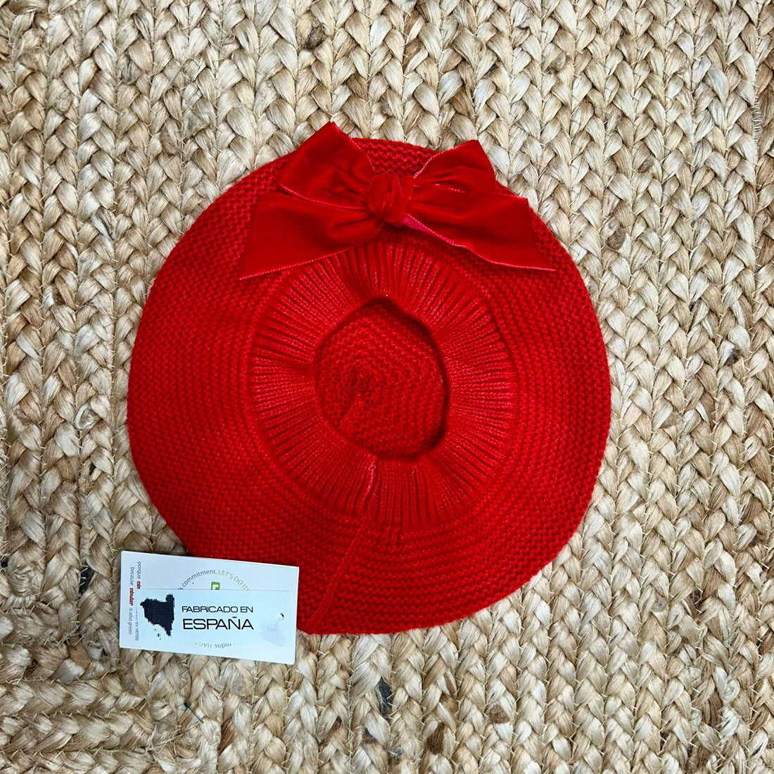 basco rosso Condor in maglia con fiocco in velluto per bambina