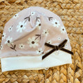 Uscita clinica neonata in caldo cotone con copertina sfoderabile, lenzuola, cappellino e bavaglino coordinati.