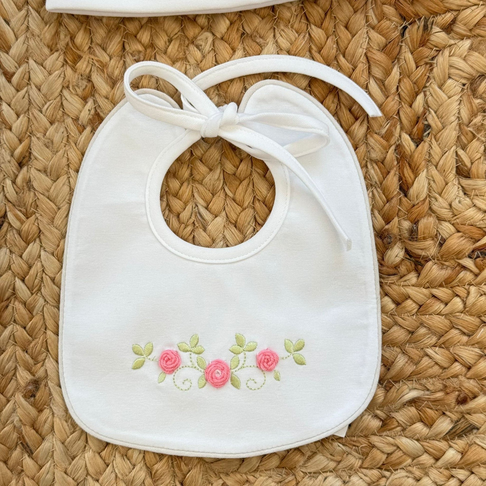 bavaglino neonato ricamato fiori rosa