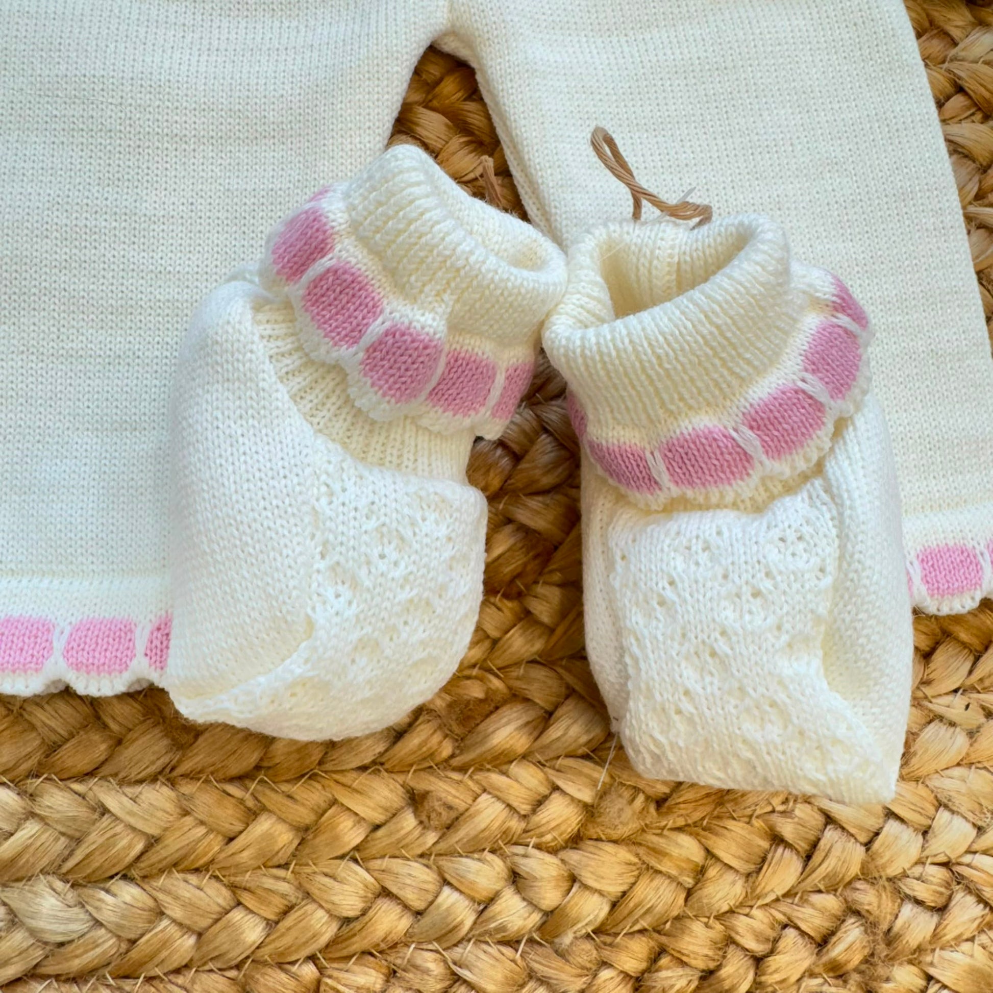 Uscita clinica neonata panna e rosa con maxi fiocchi, copertina, completo e accessori coordinati