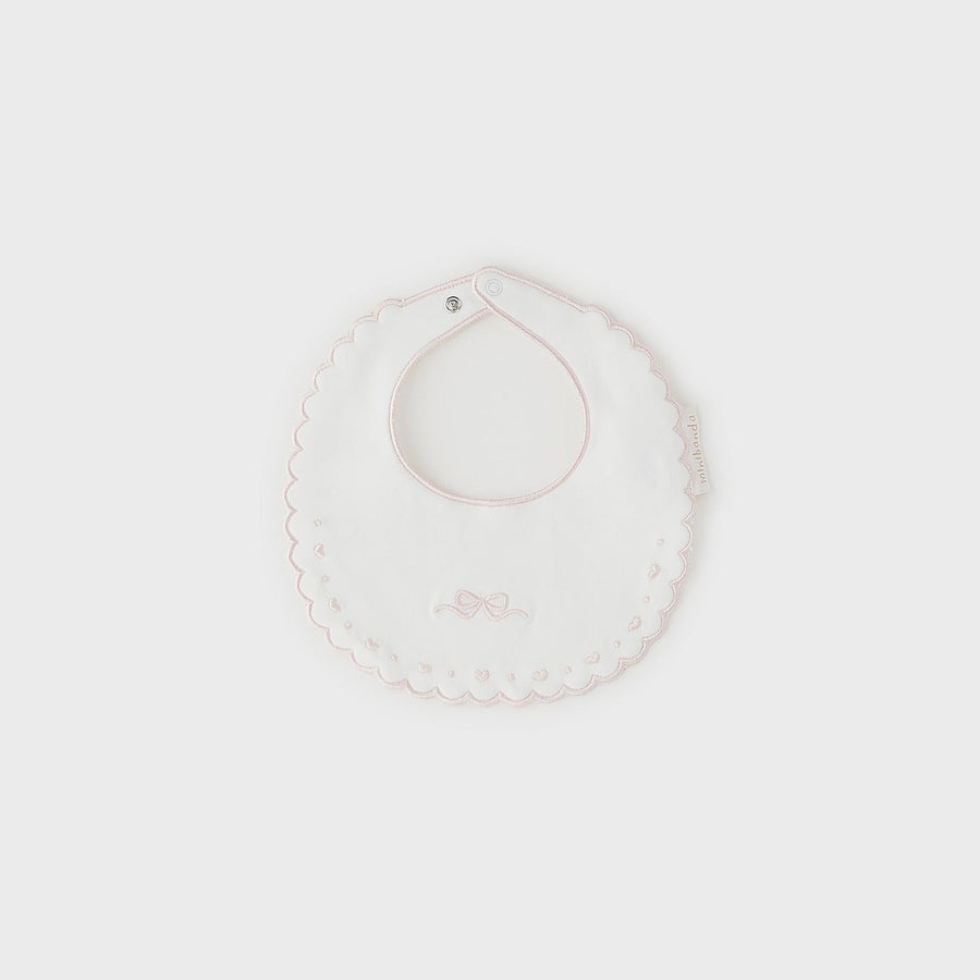 Bavetta neonata panna con ricamo fiocco rosa