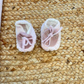 bavetta neonata in ciniglia con fascia rosa
