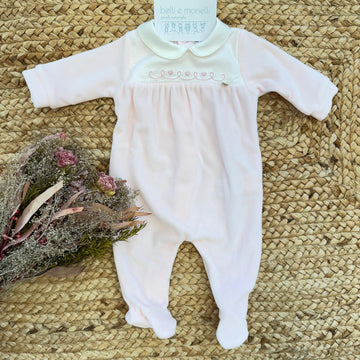 Tutina neonata ciniglia rosa con cuoricini ricamati