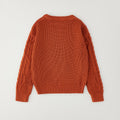 Maglione bimbo ruggine a trecce vista frontale