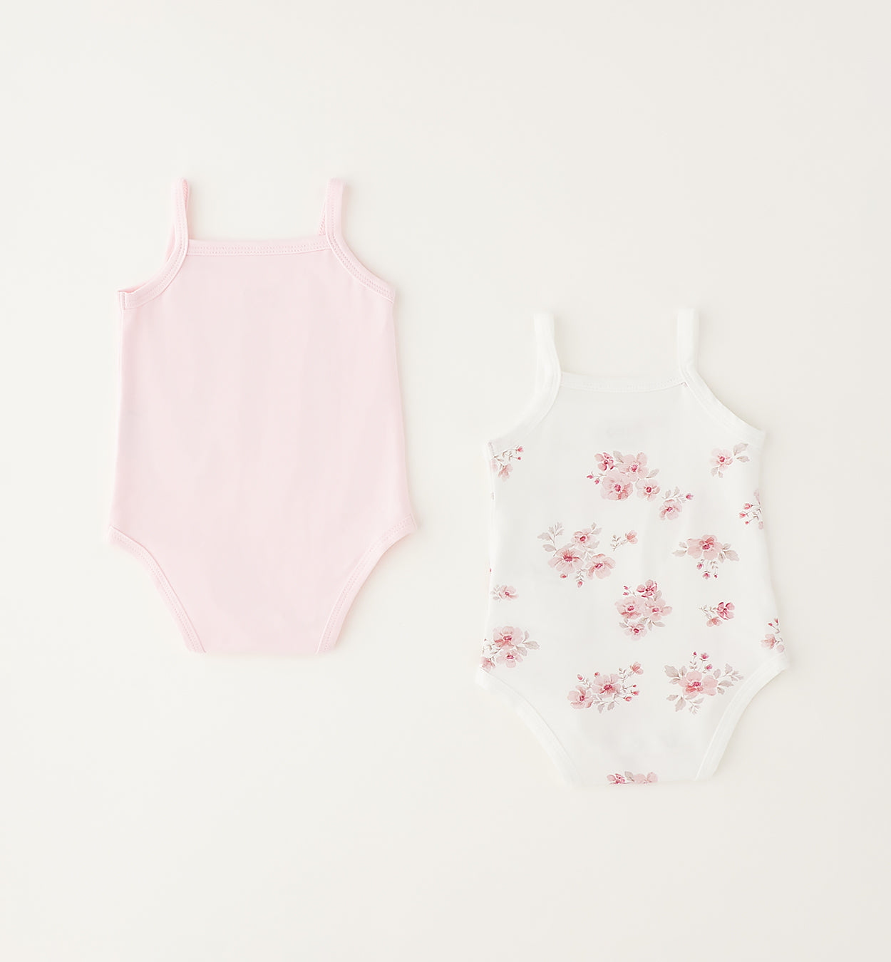 Body bianco con stampa floreale per neonata