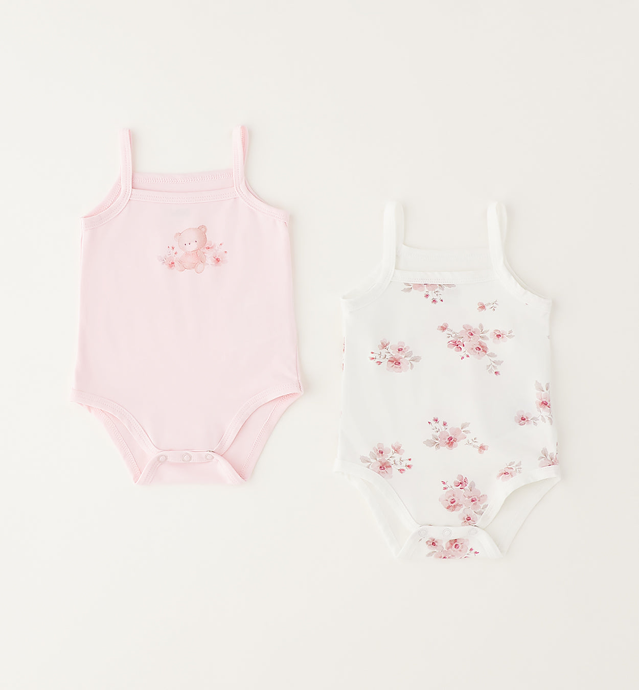 Set due body neonata 100% cotone rosa e fantasia floreale