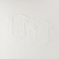 Set 2 body neonato unisex in caldo cotone bianco con apertura incrociata e decorazioni con orsetti