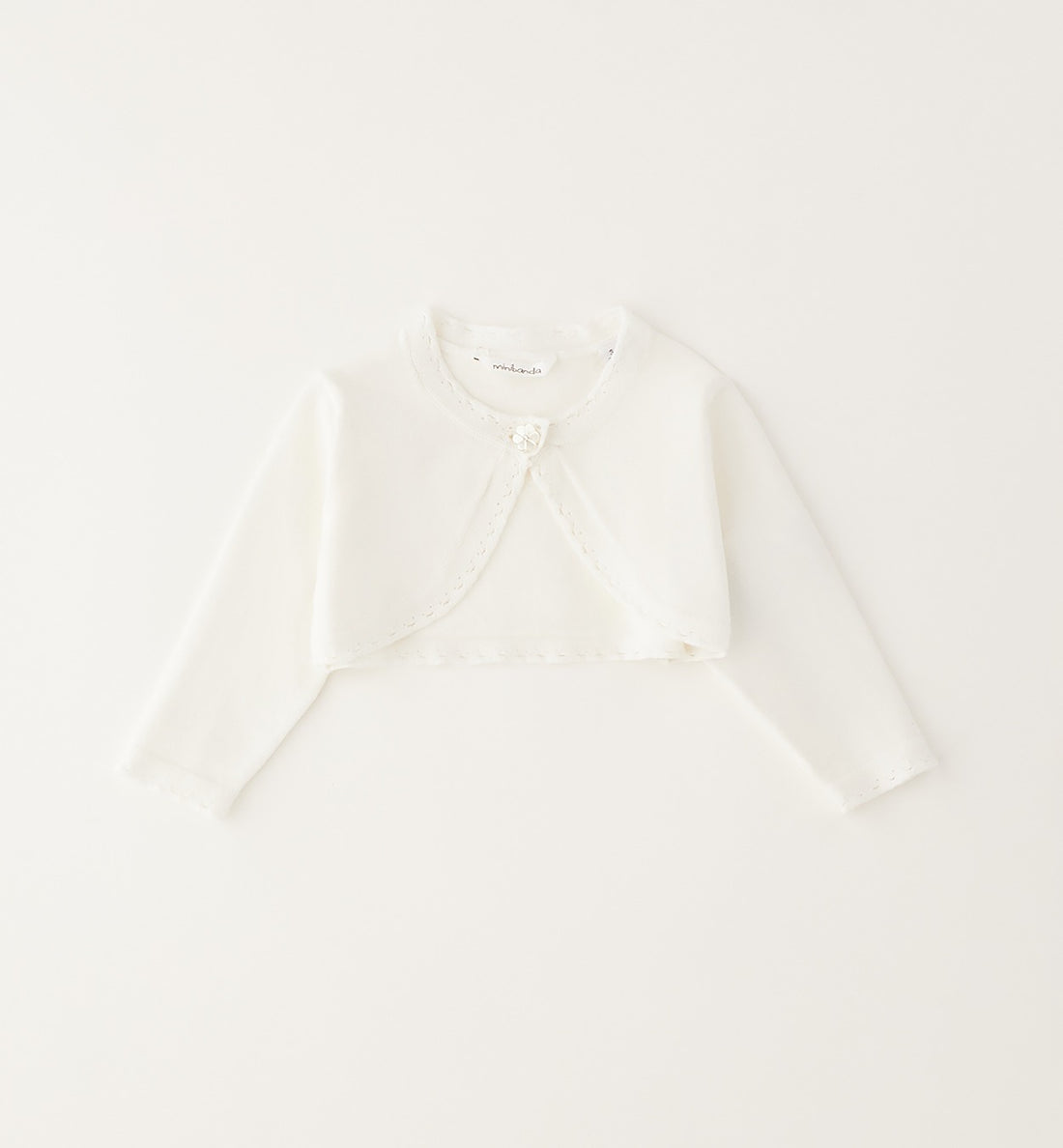 Coprispalle neonata bianco in cotone con bottone a fiore vista frontale