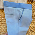 Completo battesimo bimbo con cardigan beige doppiopetto, pantaloni azzurri e papillon