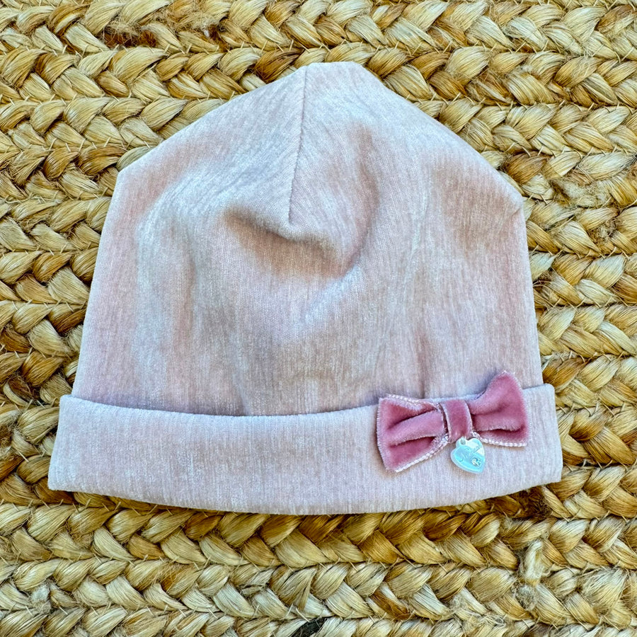 Cappellino neonata in ciniglia rosa con fiocco