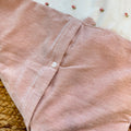 Uscita clinica neonata in ciniglia rosa con copertina sfoderabile e completo lenzuola.