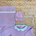 Uscita clinica neonata rosa completa con copertina, tutina, cappellino e scarpine Made in Italy.