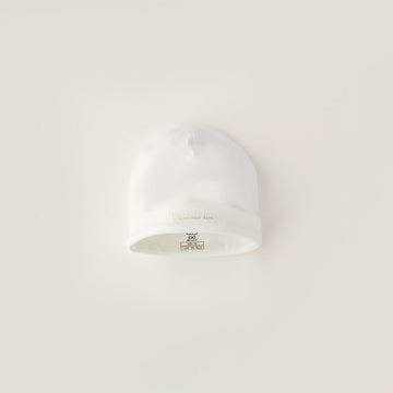 Cappellino neonato unisex in caldo cotone bianco con risvolto per corredino nascita e primo cambio