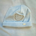 Uscita clinica neonato cielo e beige in ciniglia completa con copertina sfoderabile, tutina, cappellino e lenzuolino.