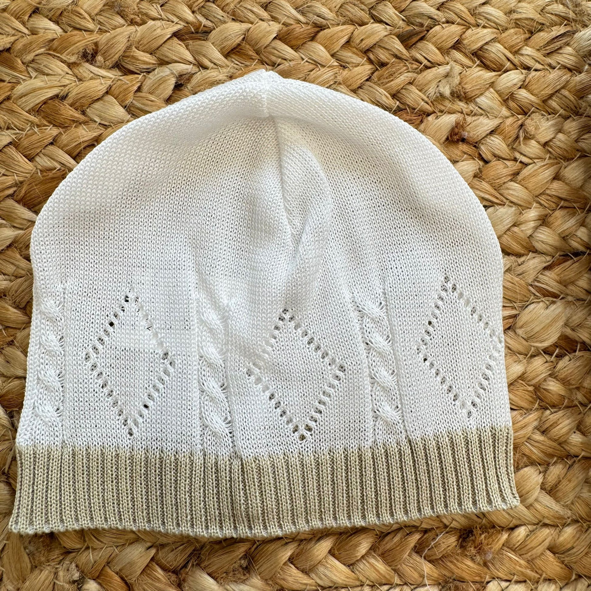 cappellino neonato in cotone lavorazione rombi