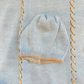 Uscita clinica neonato in misto lana azzurro e beige con copertina completo cappellino scarpine e bavaglino