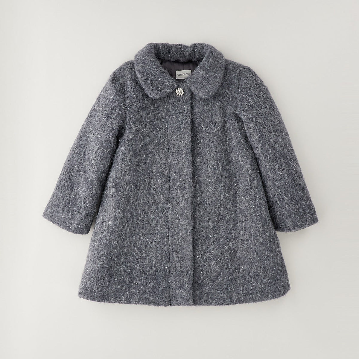Cappotto bimba grigio elegante con colletto arrotondato, dettaglio gioiello e linea svasata