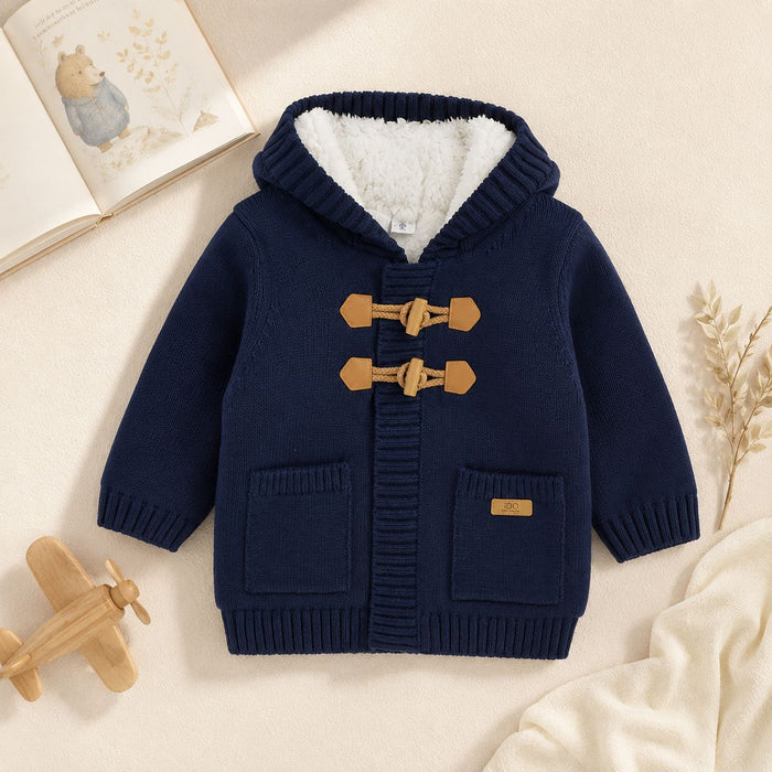 Cardigan bambino blu con cappuccio, interno morbido bianco e chiusura con alamari