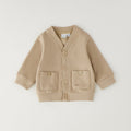 Cardigan bimbo beige con bottoni, scollo a V e tasche applicate