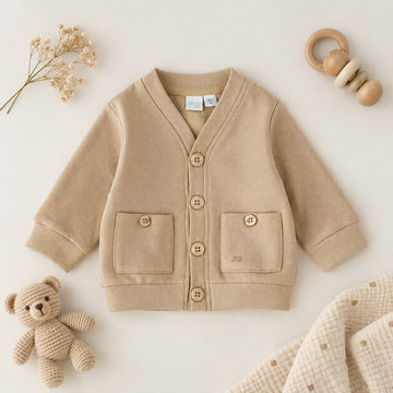 Cardigan bimbo beige con bottoni, scollo a V e tasche applicate