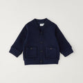 Pantalone bambino blu a microfantasia visto dal retro con tasche applicate