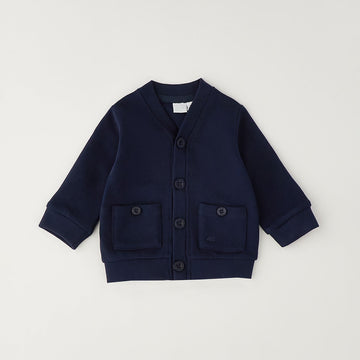 Pantalone bambino blu a microfantasia visto dal retro con tasche applicate