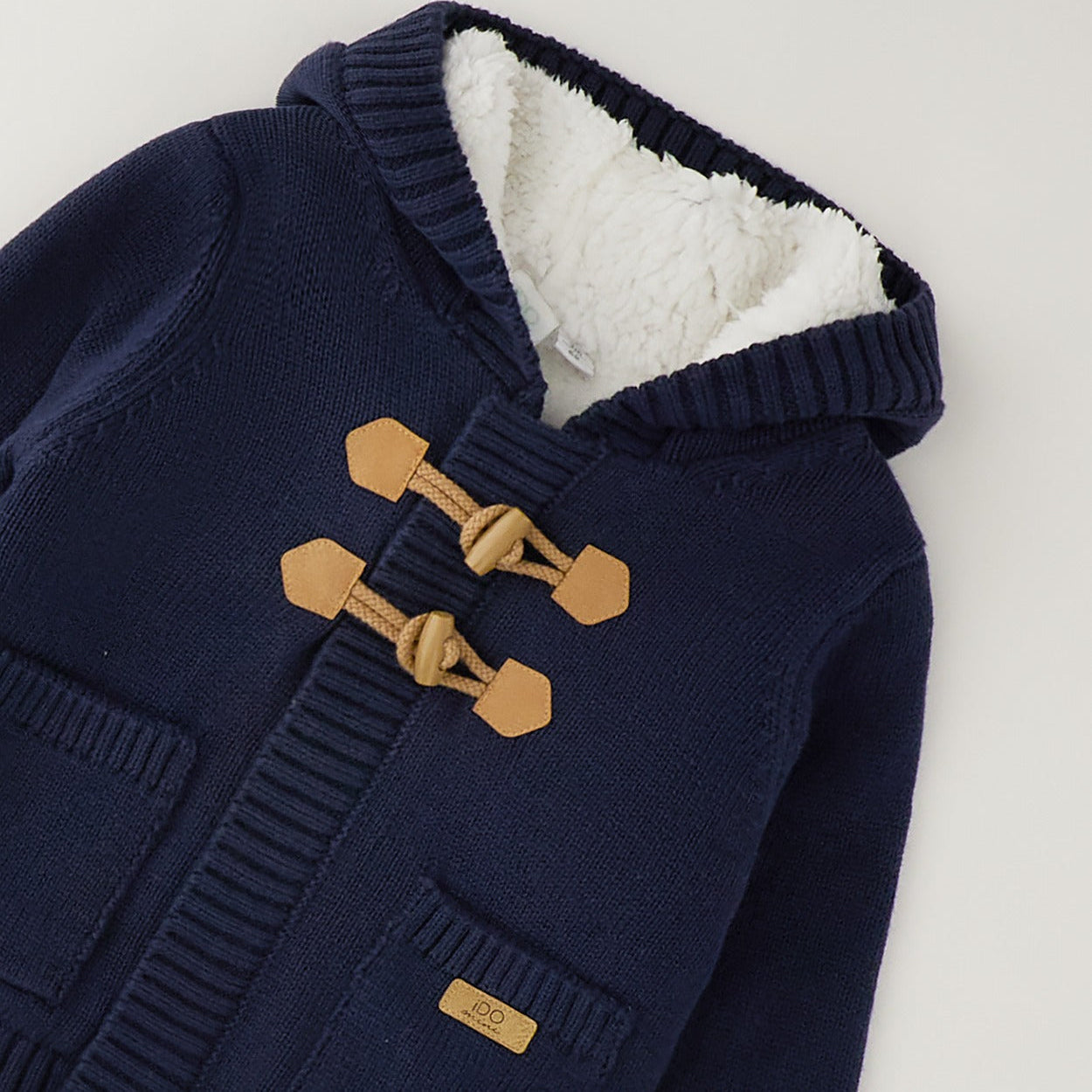 Cardigan neonato blu 100% cotone con cappuccio, interno morbido, alamari e tasche