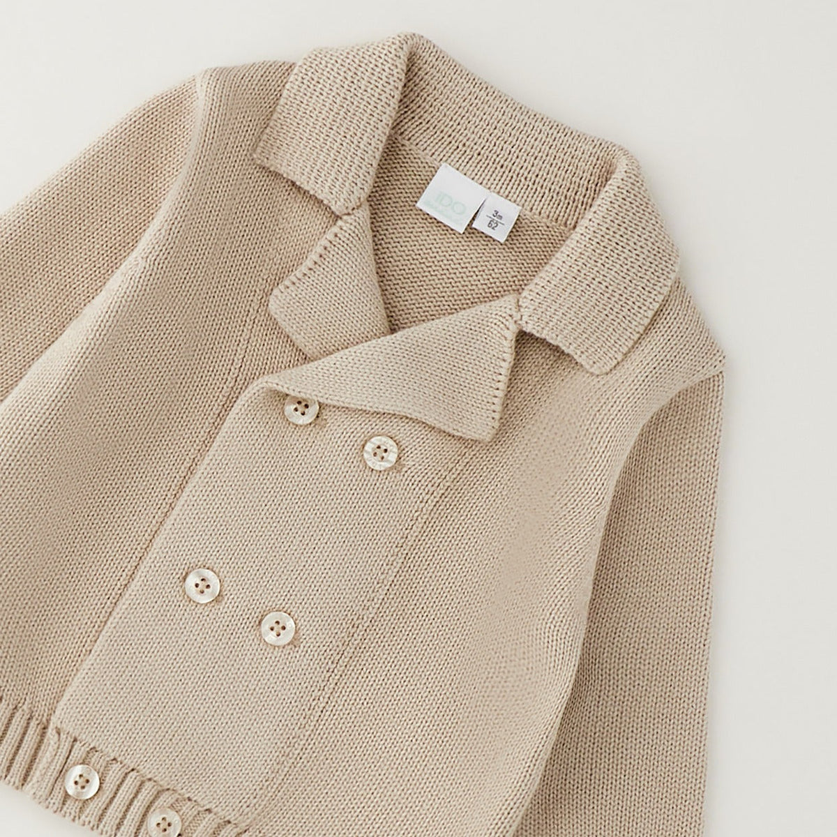 Cardigan neonato beige in 100% cotone modello doppiopetto con colletto