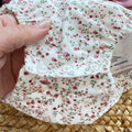 Pagliaccetto bimba in cotone vinaccio con fantasia floreale, colletto volant e fiocco rosa