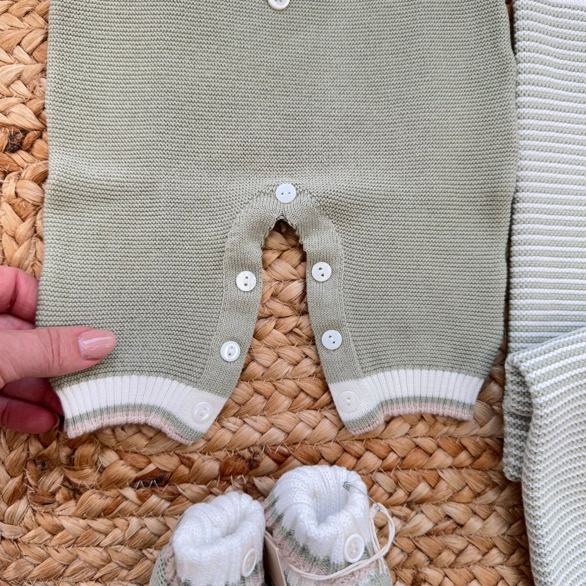 chiusura bottoni tutina neonato cotone lavorazione maglia