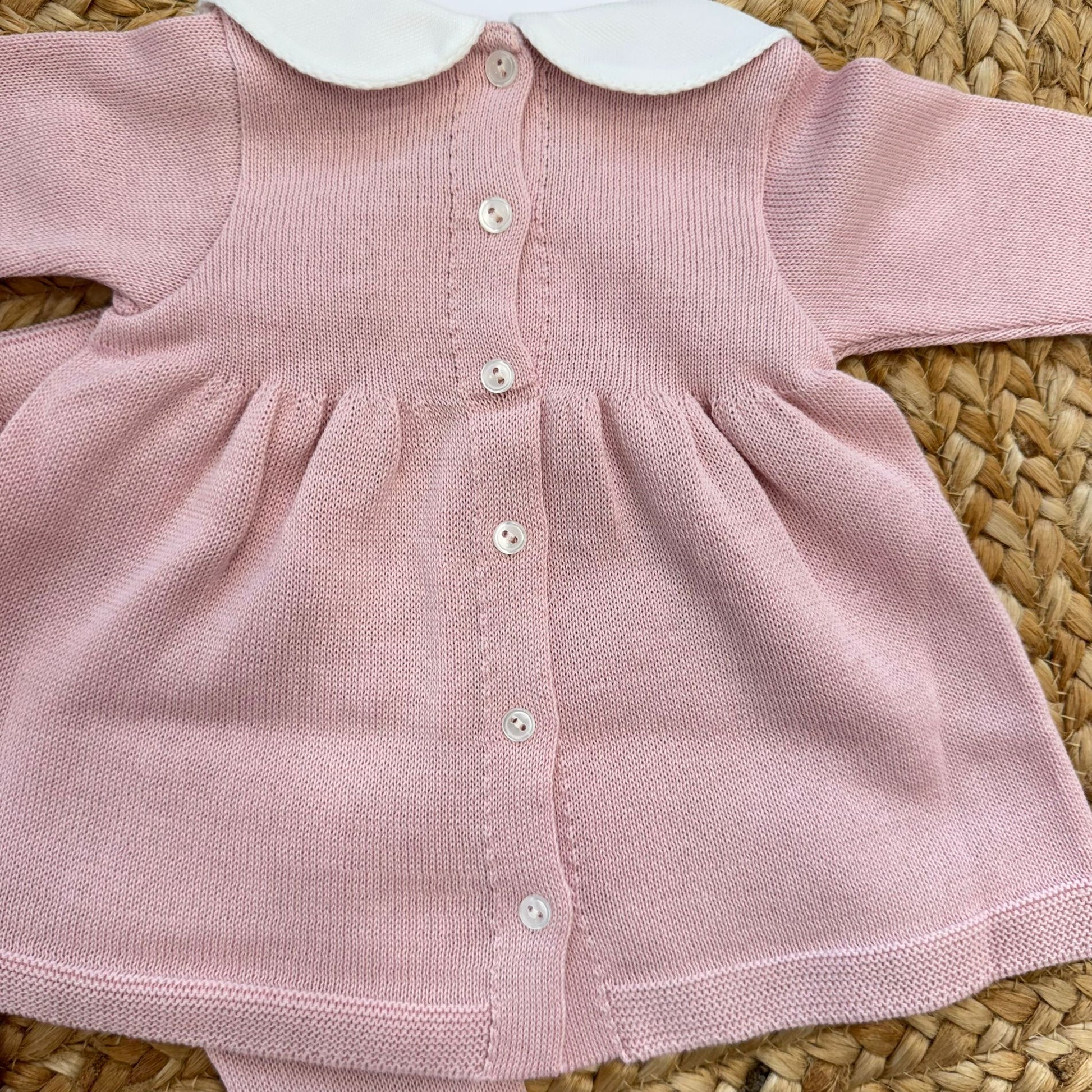 Chiusura posteriore tutina con bottoni