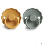 Retro dei ciucci in silicone giallo e verde con tettarella naturale

