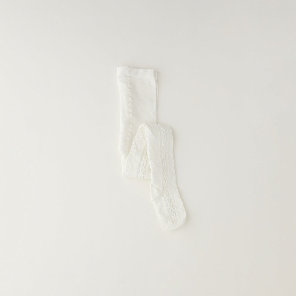 Collant bimba bianchi lavorati, eleganti calze da bambina per Battesimo e cerimonia.