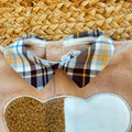 Tutina neonato in ciniglia beige con orsetto e colletto tartan