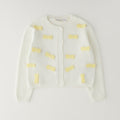 Completo 3 pezzi bimba con cardigan bianco fiocchi gialli, maglia e gonna tartan grigia e gialla