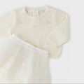 	Completo elegante bimba avorio con maglioncino a cuori e gonna in tulle dorato
