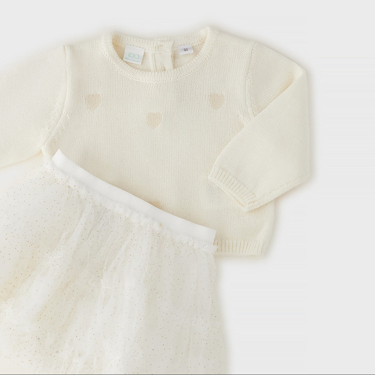 	Completo elegante bimba avorio con maglioncino a cuori e gonna in tulle dorato