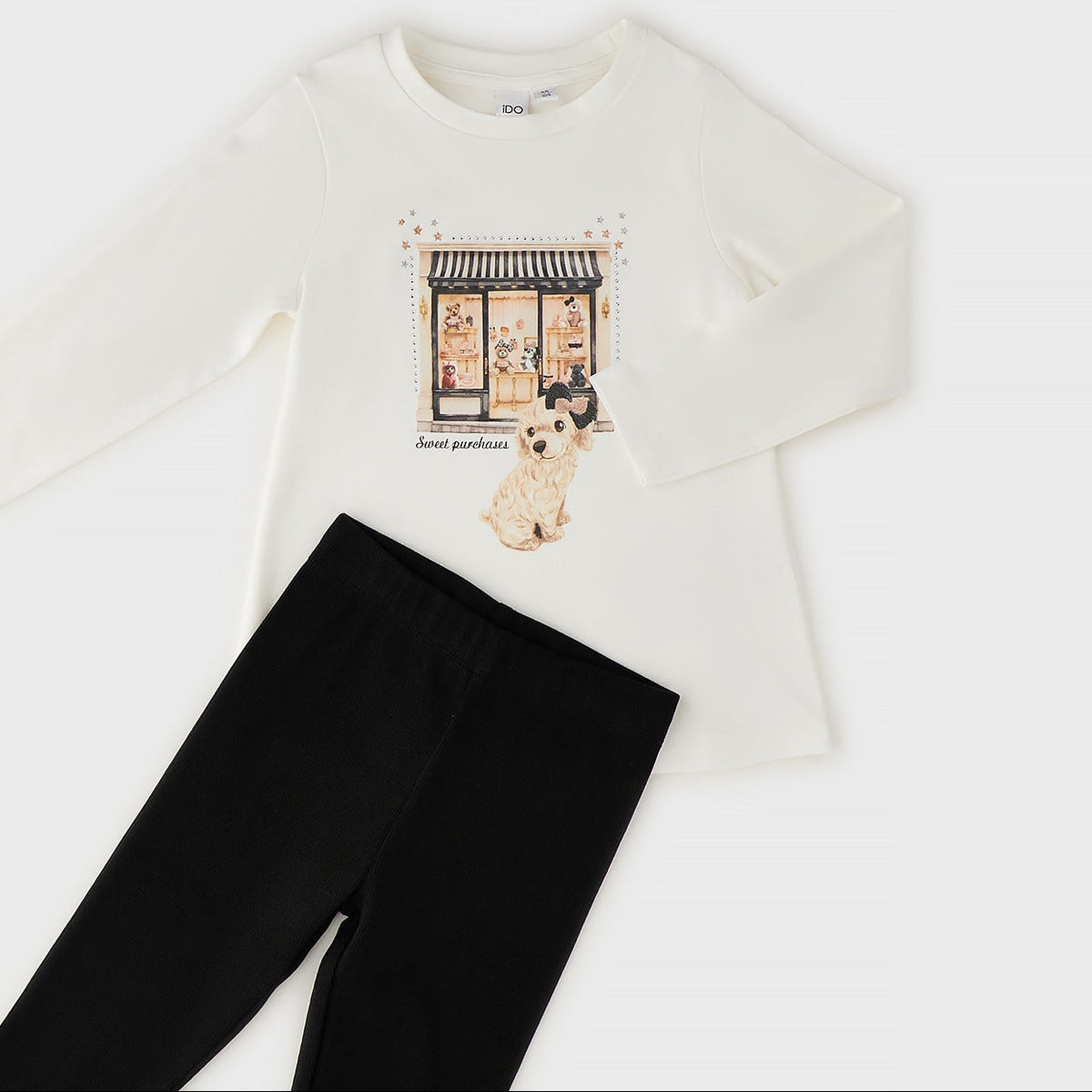 Completo bimba caldo cotone con maglia panna stampata e leggings neri